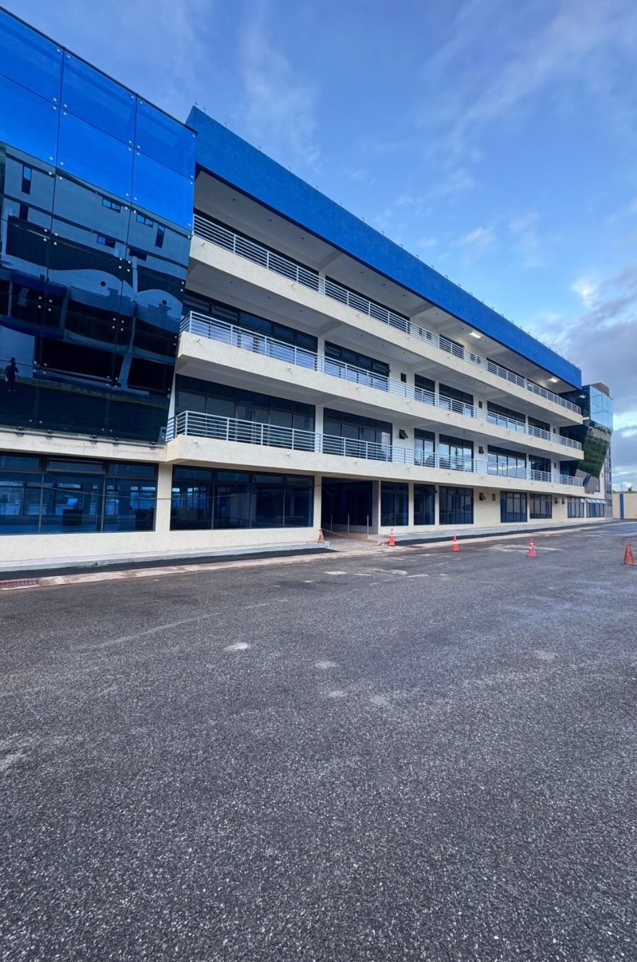 Block A facade with balconies and blue glass curtain wall